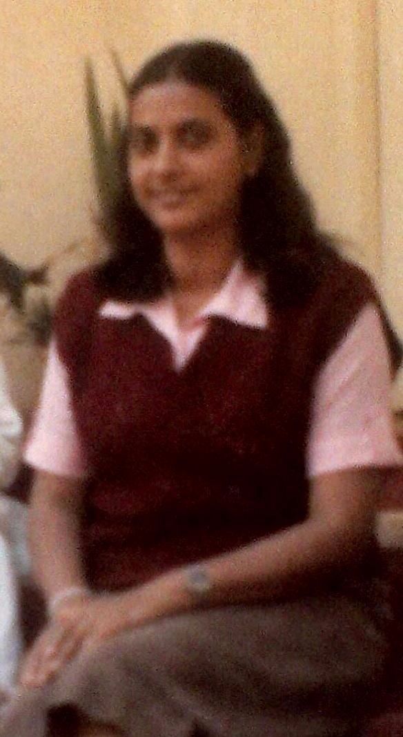 A smart, always smiling young lady!