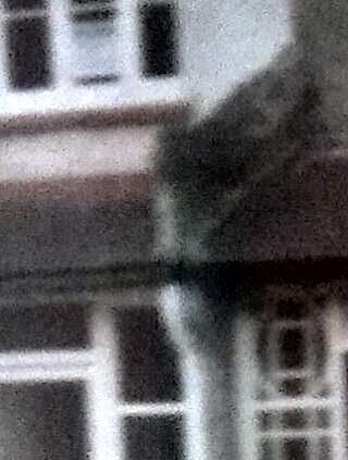 Khallaji Najma in front of her London house,